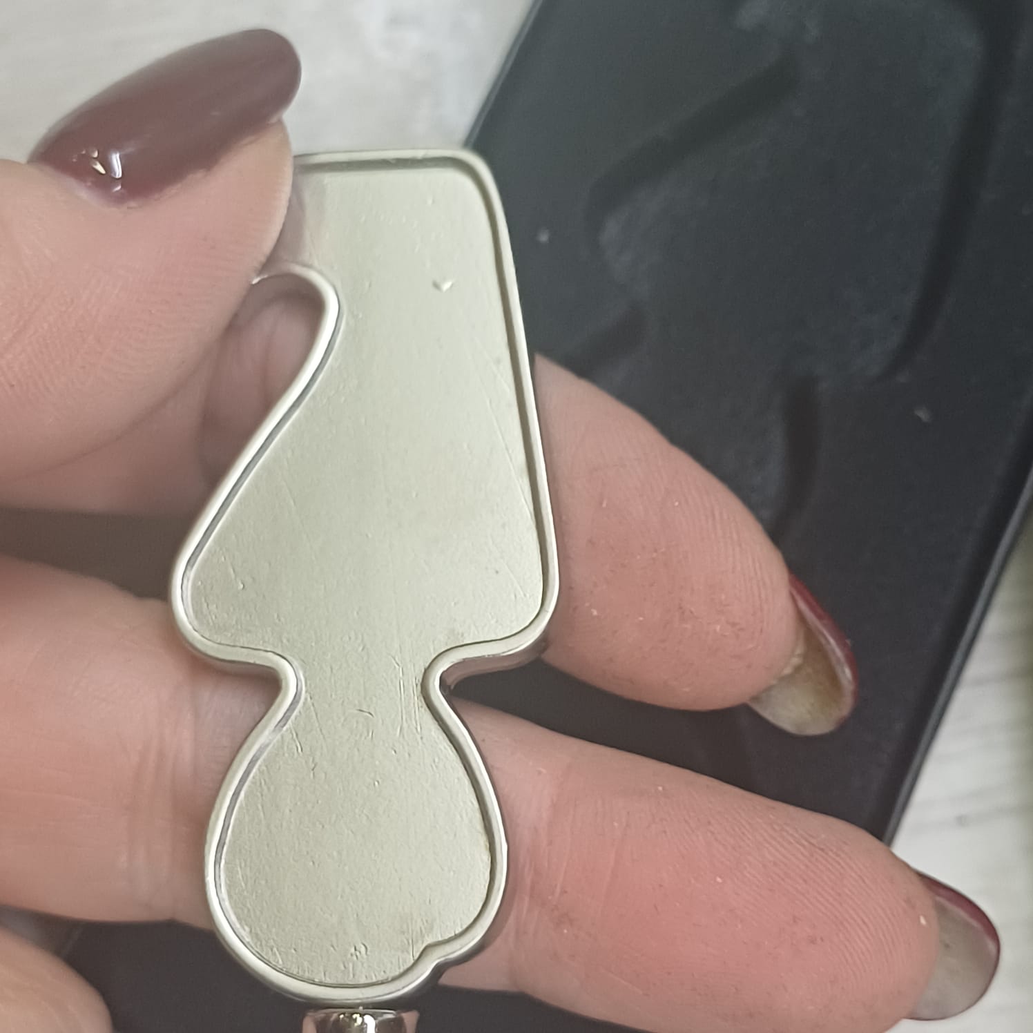 Брелок-открывалка Human